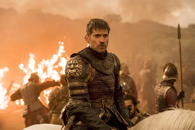 Jaime alone walking amongst flames.